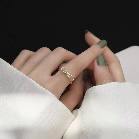 S925 Sterling Silver Simple Line Hollow Bowknot Ring Open Ring for Women -500(45%)