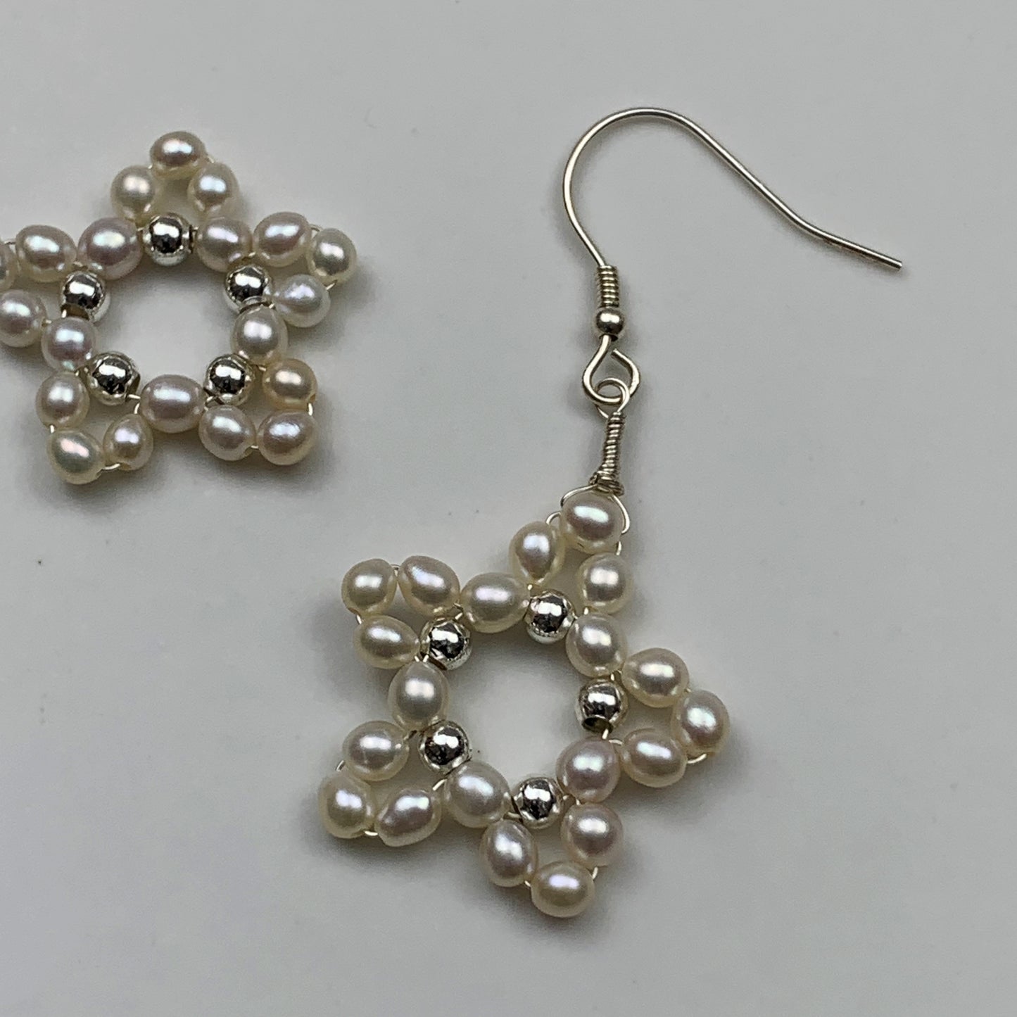 27. Star Pearl earrings