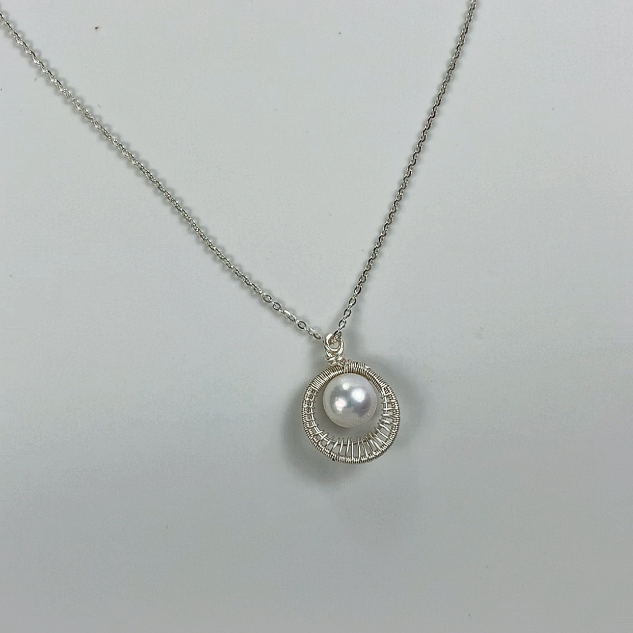 77.Edison Pearl pendant of eye