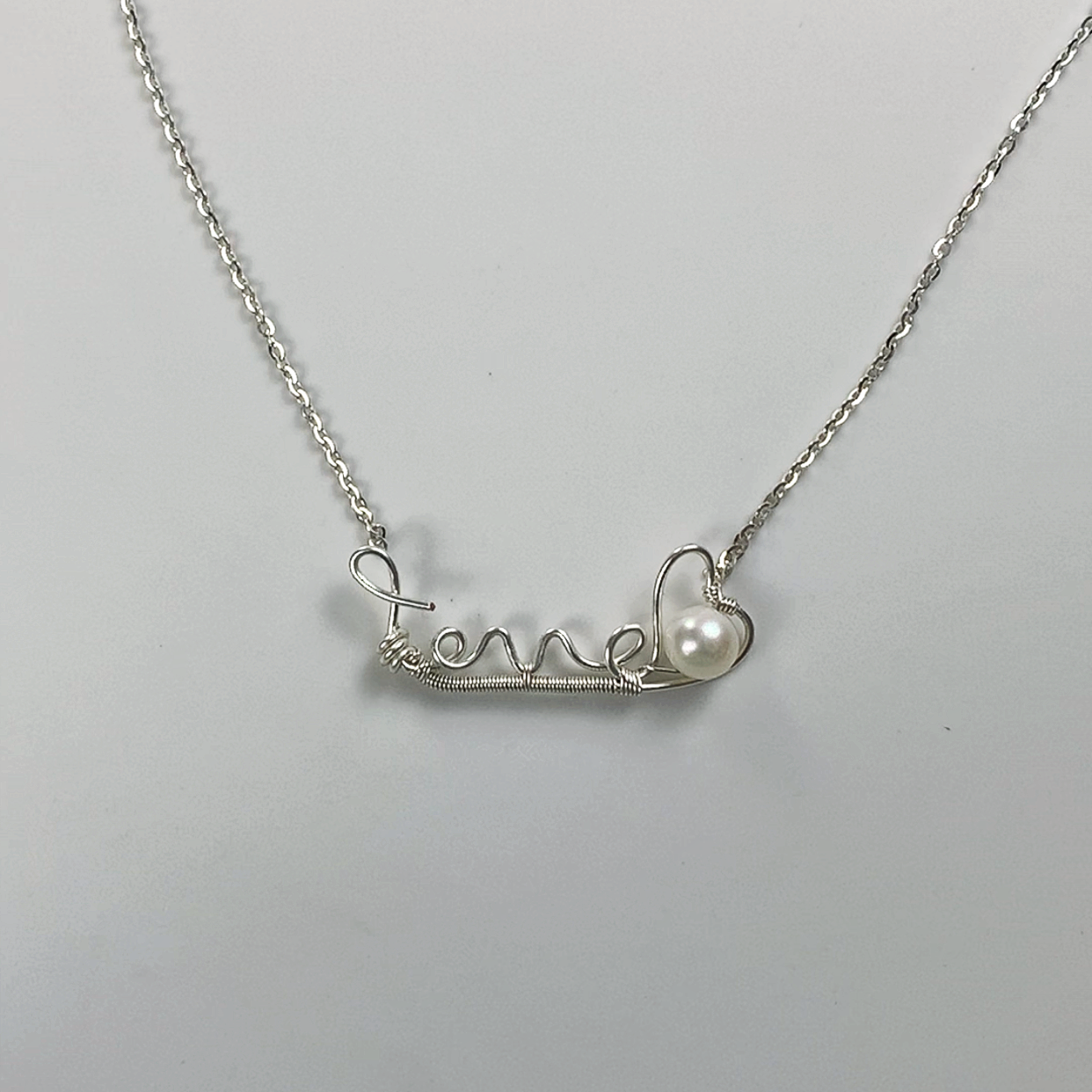 80.Pearl pendant in the name of love